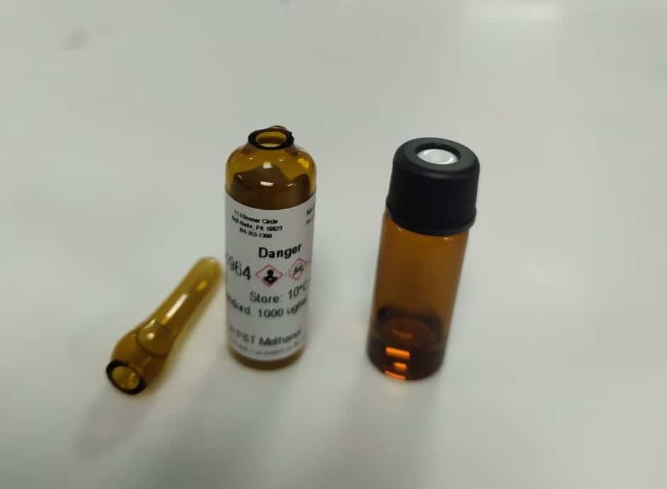 reference standard stuck in top of opened ampul