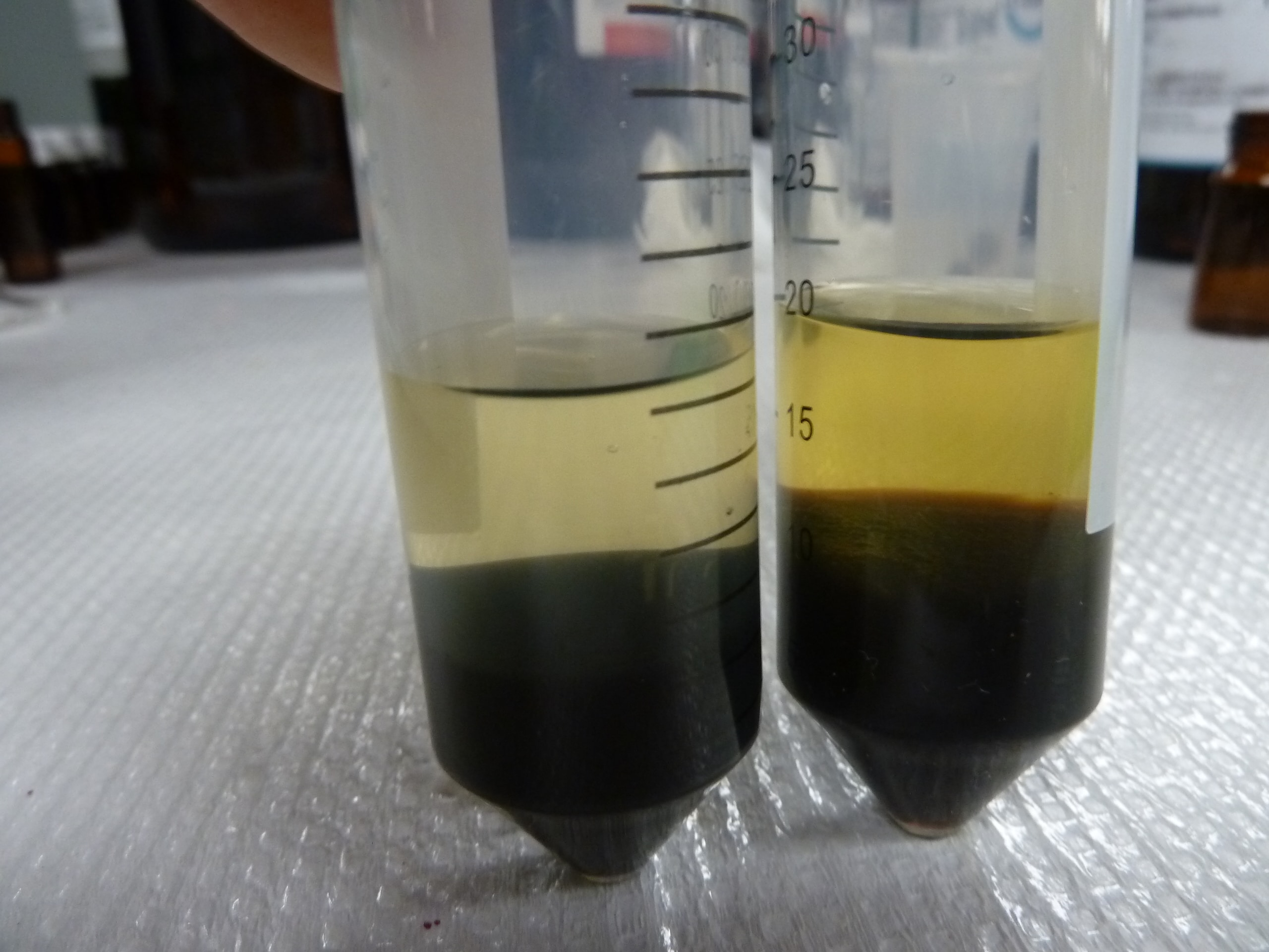 a couple of glasses with liquid in them