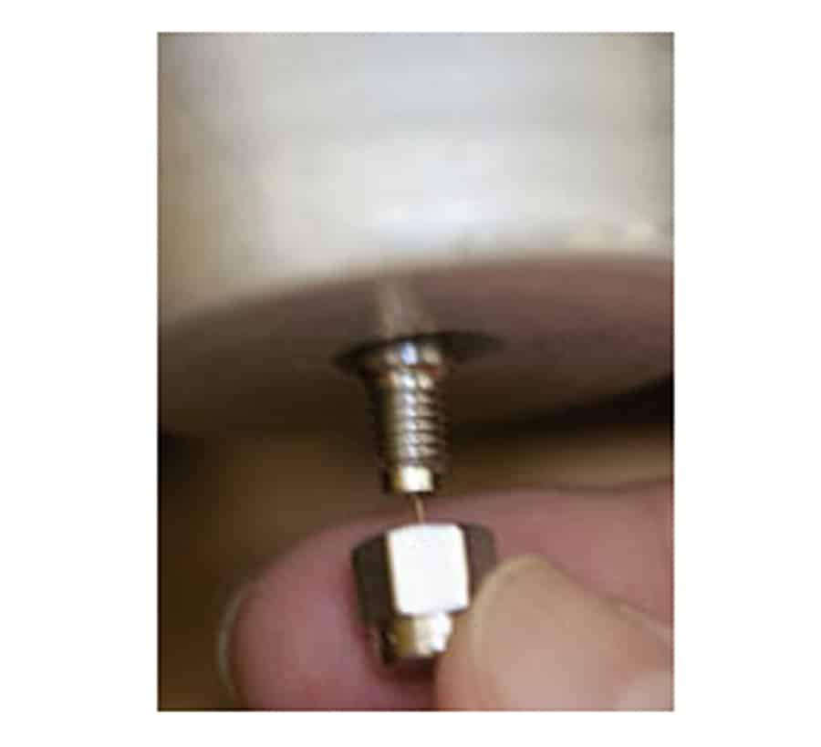 Column being inserted into the adaptor fitting.