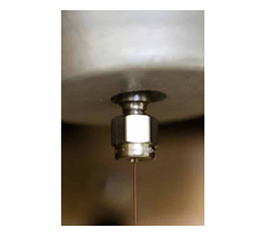 Sealing nut being tightened onto the adaptor fitting.