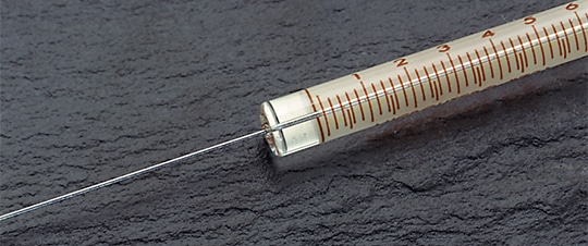 Closeup of N, Cemented Needle / F, Fixed needle syringe termination