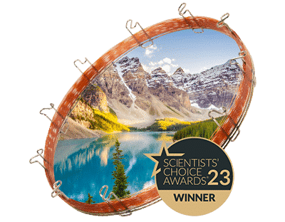 An Rxi-SVOCms column set against a serene mountain lake, with the SelectScience winner badge atop.