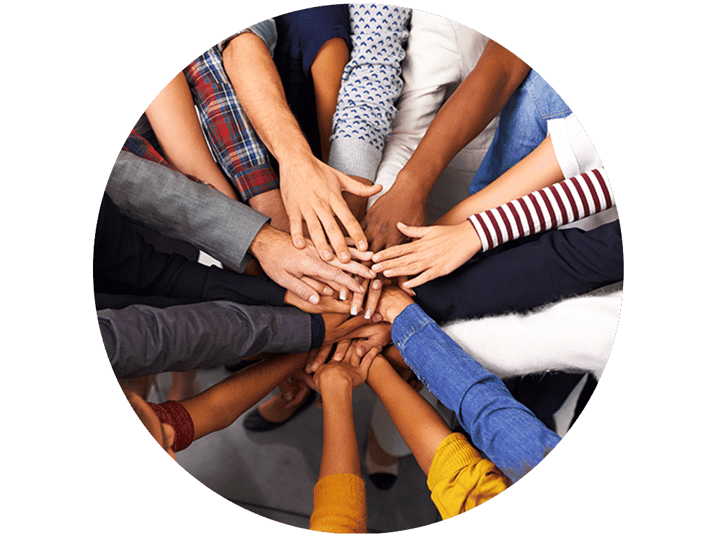 A group of diverse hands coming together to celebrate.